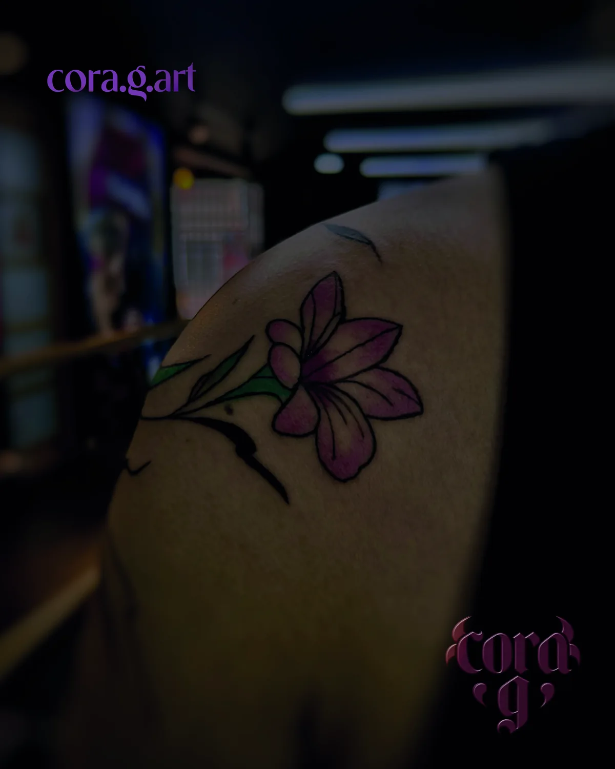 Colour flower tattoo on the hand by Cora G at Garavatto