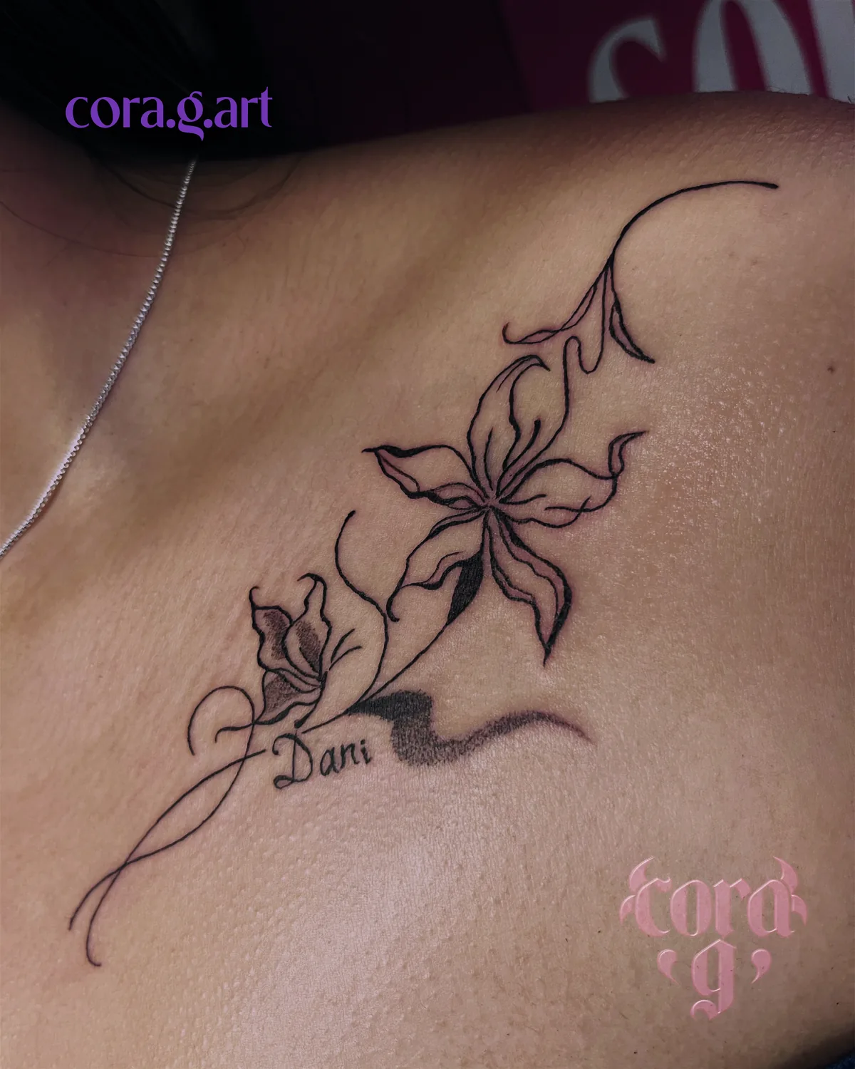 Fine line flower tattoo by Cora G at Garavatto
