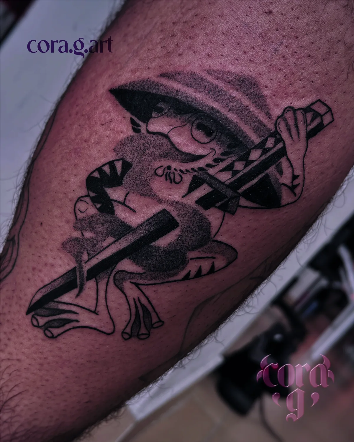 Blackwork frog with pencils tattoo by Cora G at Garavatto